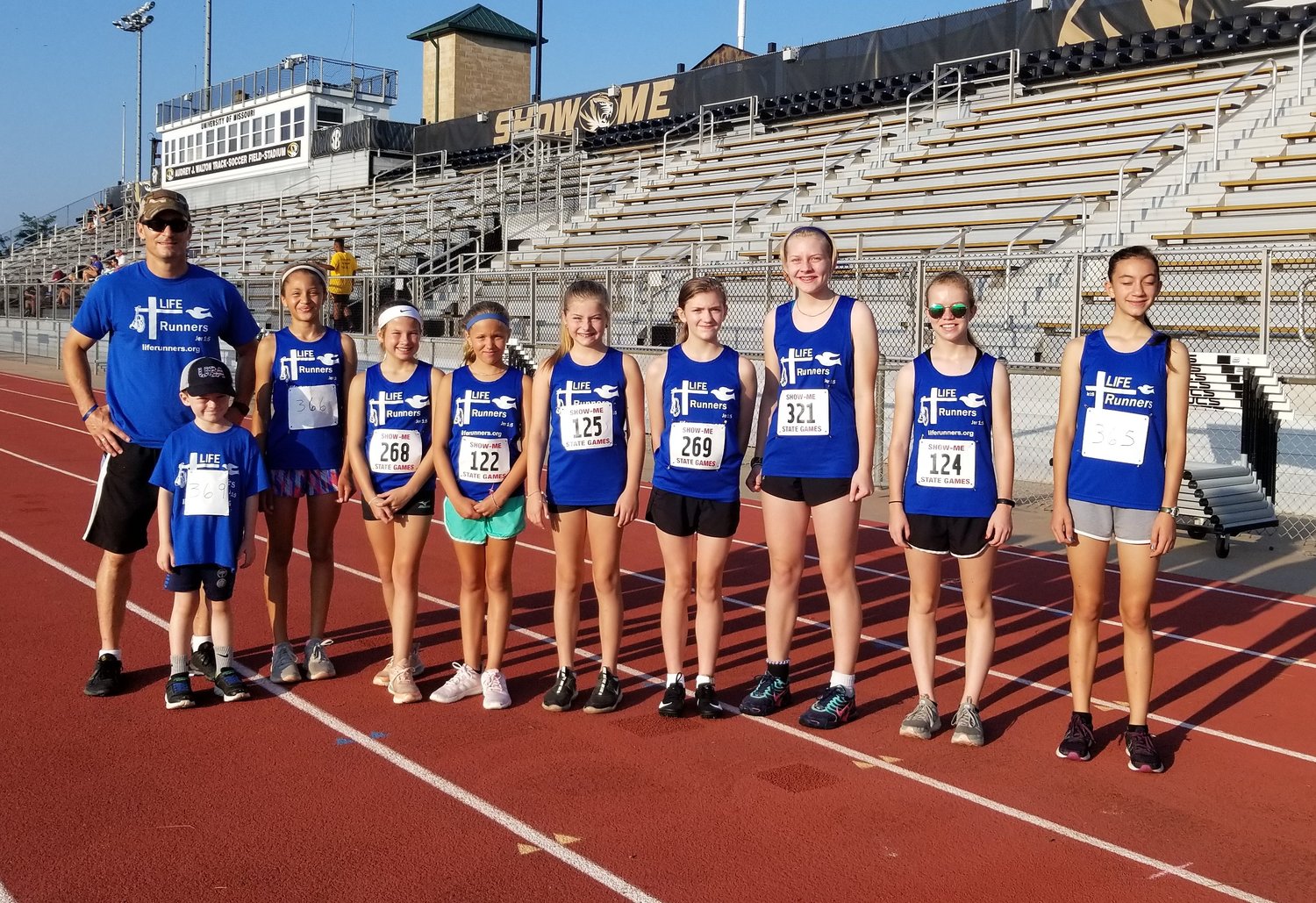 Nine children and four adults who are members of the LIFE Runners team earned 22 track and field medals while proclaiming the sanctity of human life at this year’s Show-Me Games in Columbia, Mo.